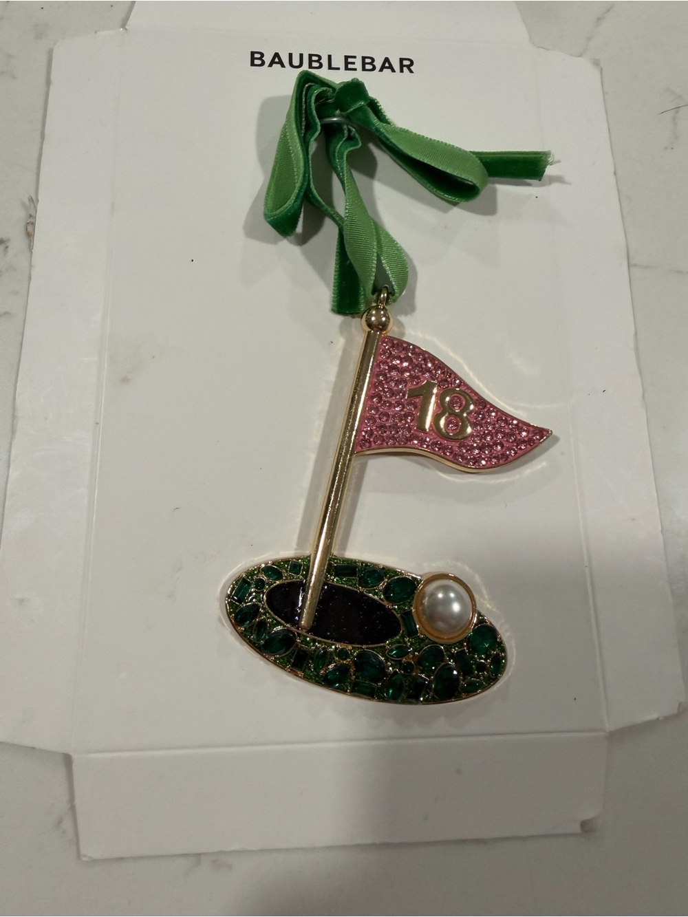 BaubleBar Green Ribbon Golf 18th Hole ornament